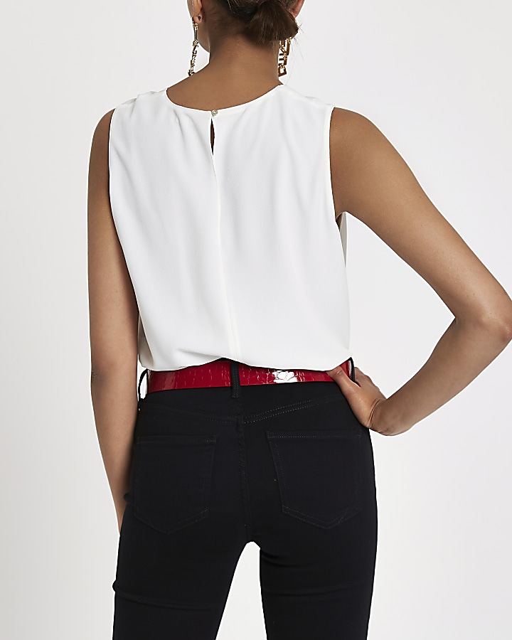 White knot front sleeveless top