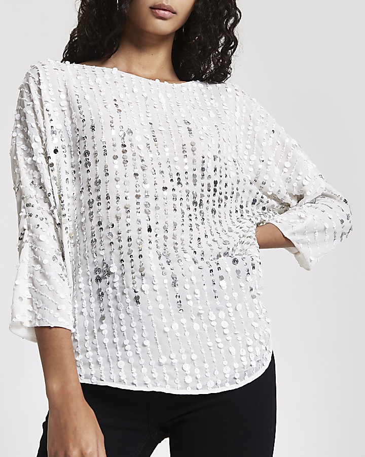 White sequin batwing top