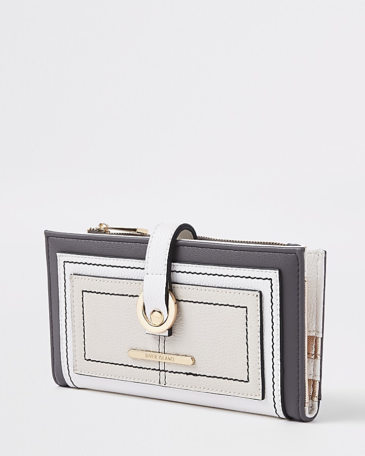 Light beige pocket front hoop purse