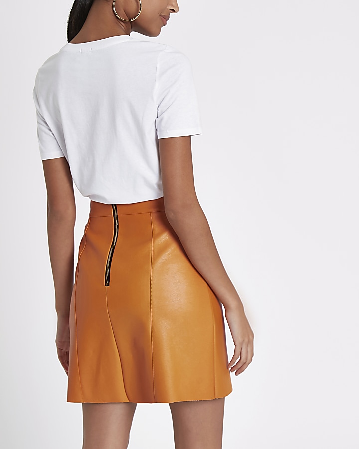 Orange faux leather mini skirt