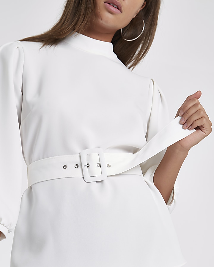 White loose fit cuffed hem belted top