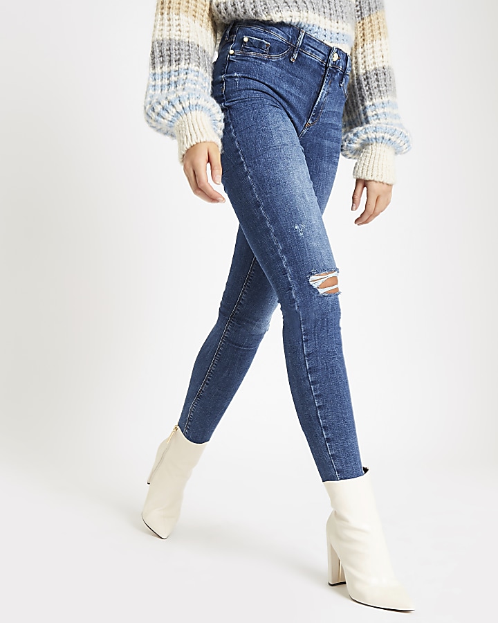 Mid blue pearl button raw hem Molly jeggings