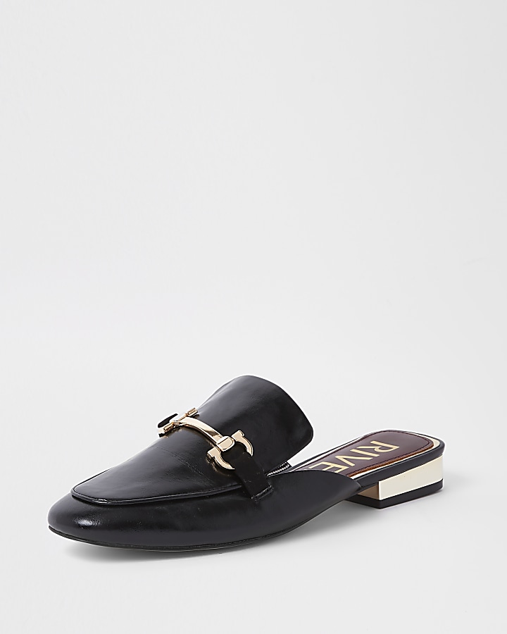 Black snaffle backless loafers