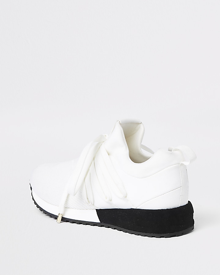 White lace-up runner trainers