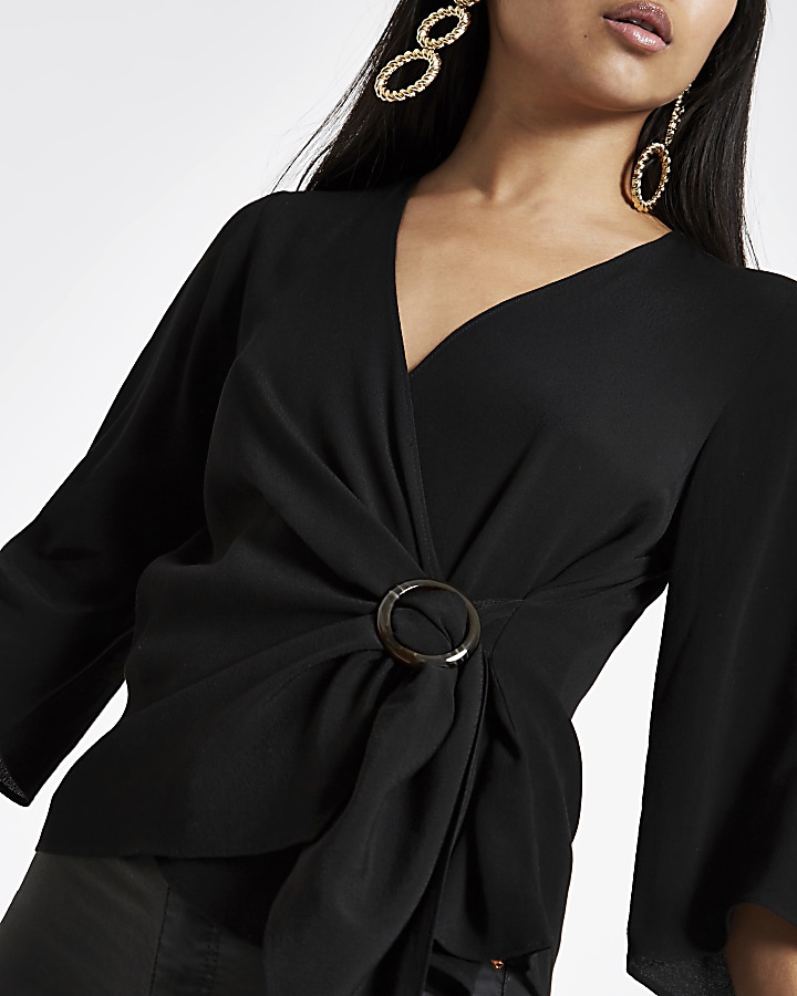 Petite black buckle wrap blouse