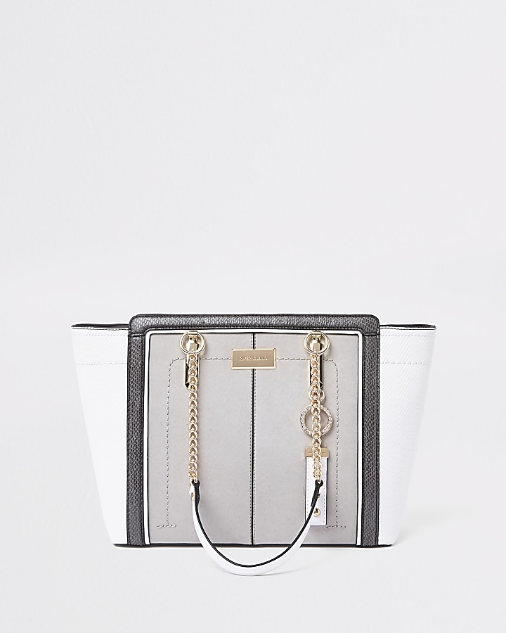 Light grey winged chain handle tote bag