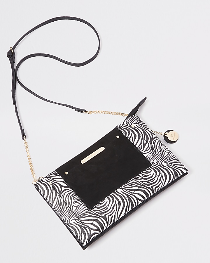 Black zebra print cross body pouch bag