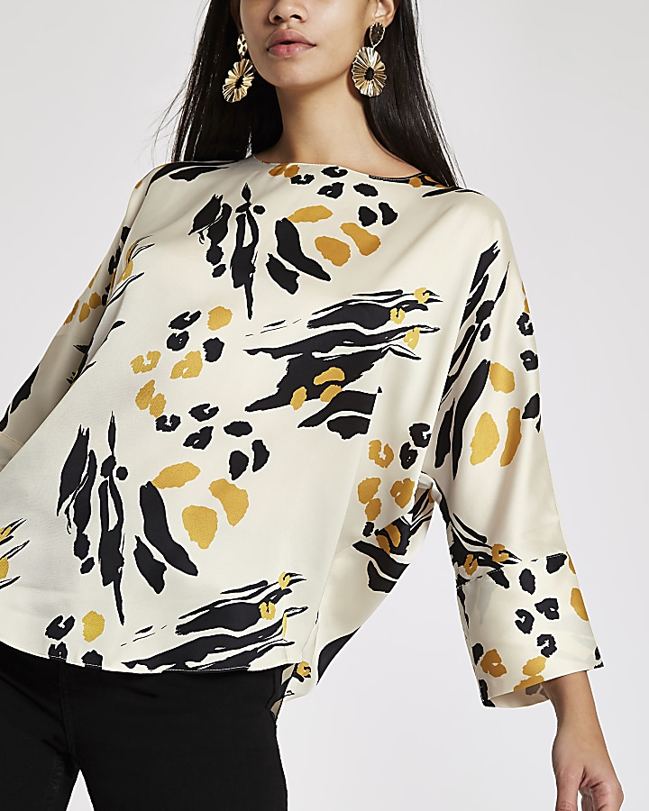 Cream abstract print batwing sleeve top