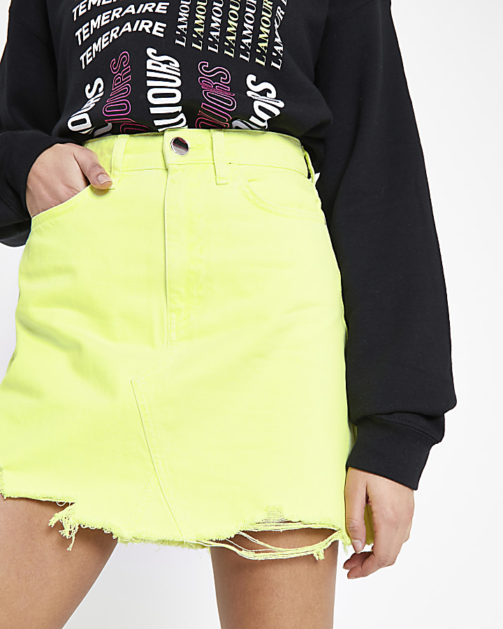 Neon yellow mini denim skirt