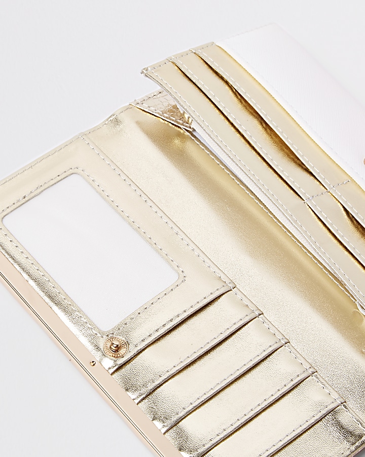 White metallic cutabout clip top purse