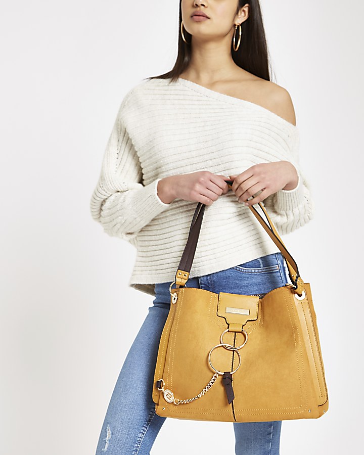 Dark yellow ring front slouch bag