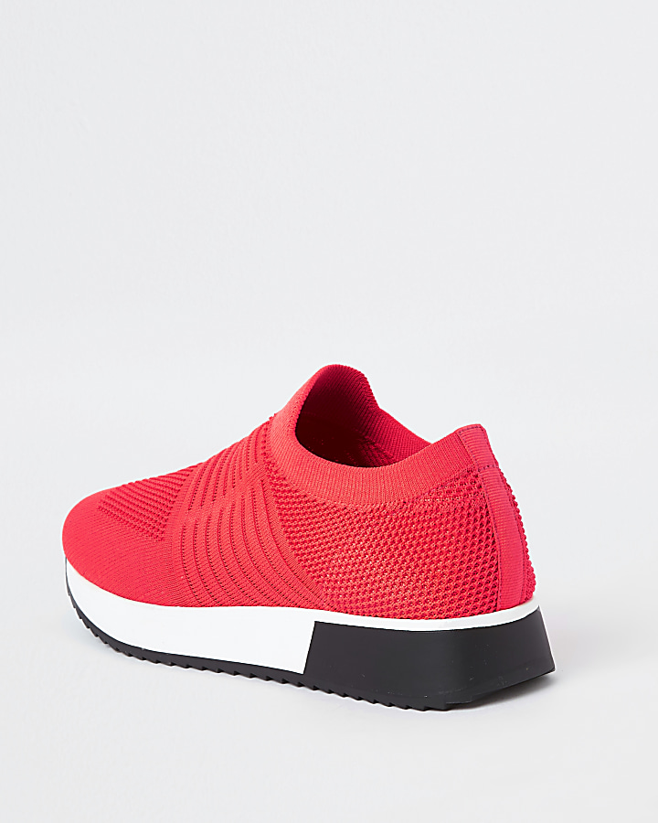 Neon coral knitted runner trainers