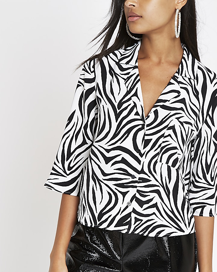 White zebra print crop blouse