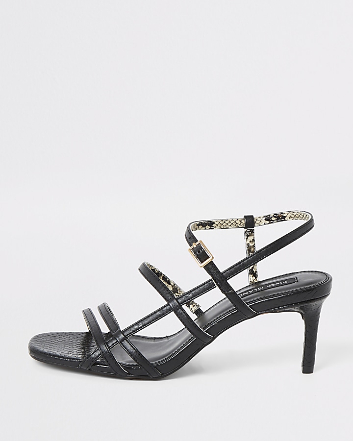 Black caged skinny heel sandals