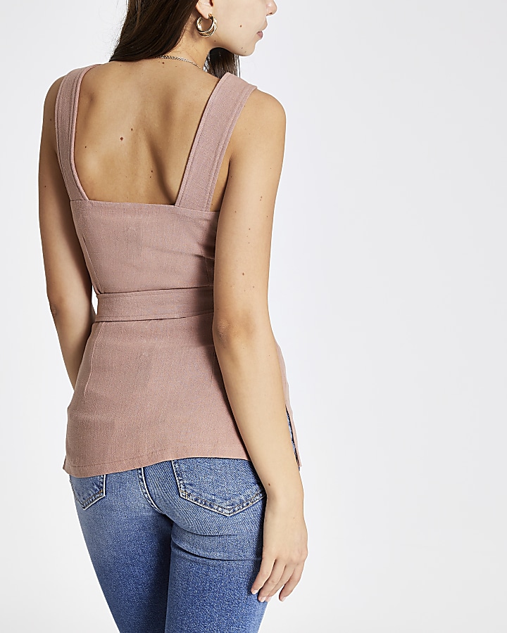 Pink belted sleeveless top