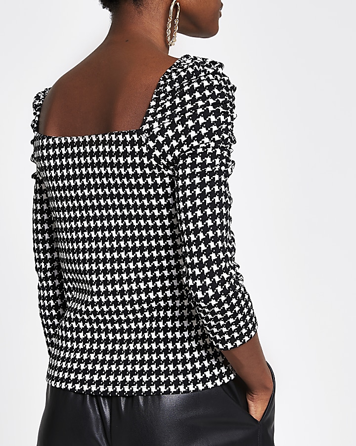 Black dogtooth check puff sleeve top