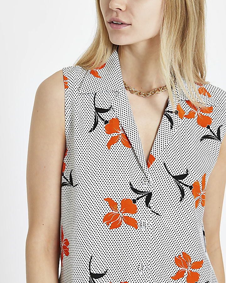Orange floral spot print sleeveless shirt