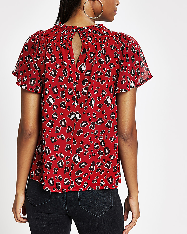 Red jacquard print frill neck shell top