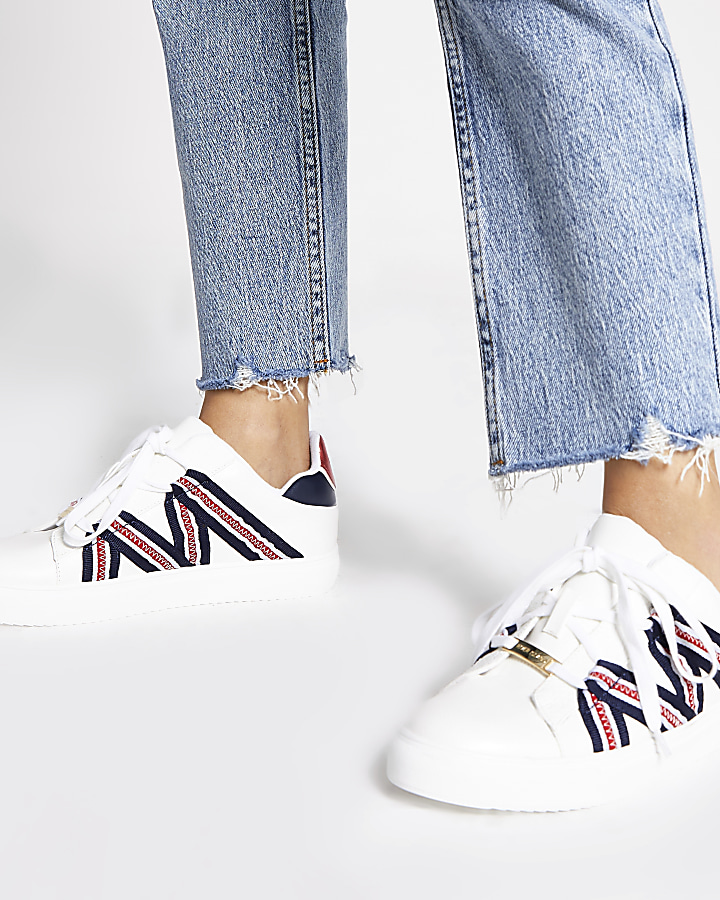 White tape lace-up trainers