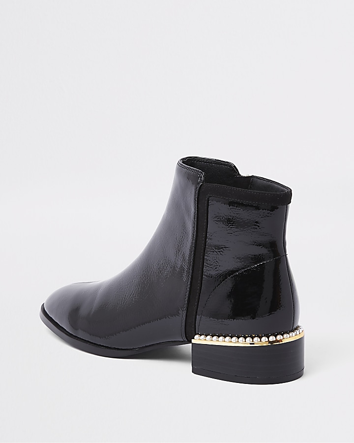 Black pearl embellished flat ankle boot
