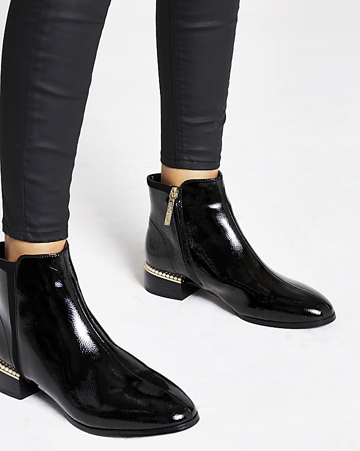 Black pearl embellished flat ankle boot