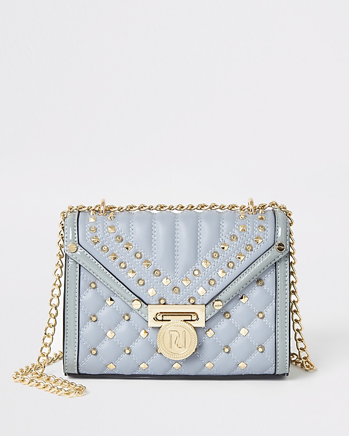 Light blue studded quilted cross body bag