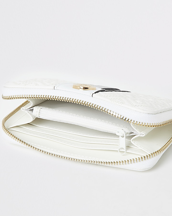 White quilted zip around purse