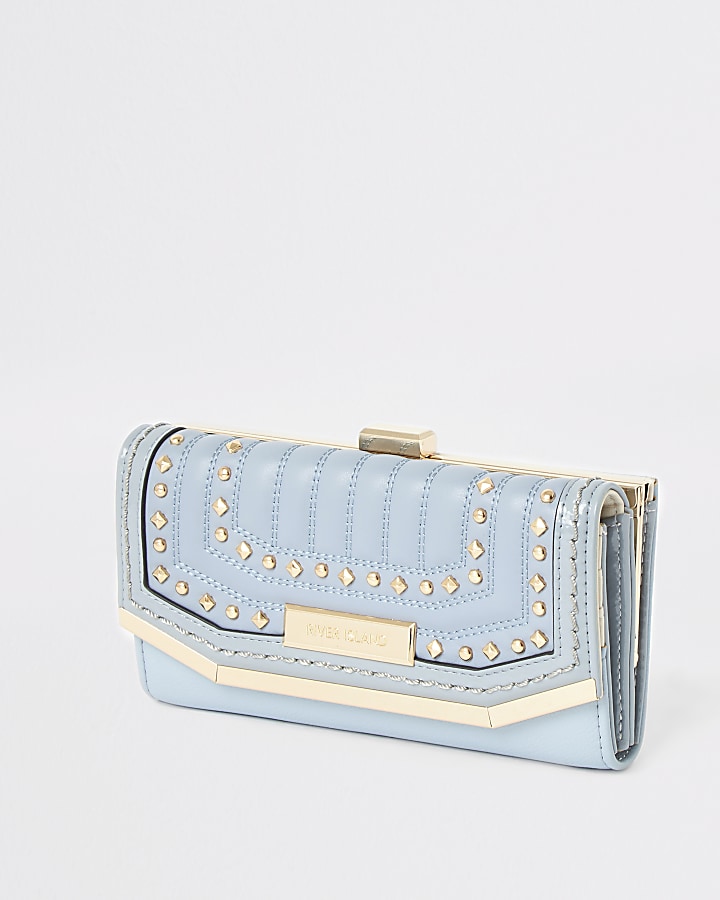 Blue studded quilted cliptop purse