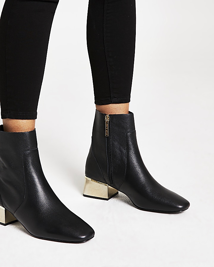Black gold tone block heel boots
