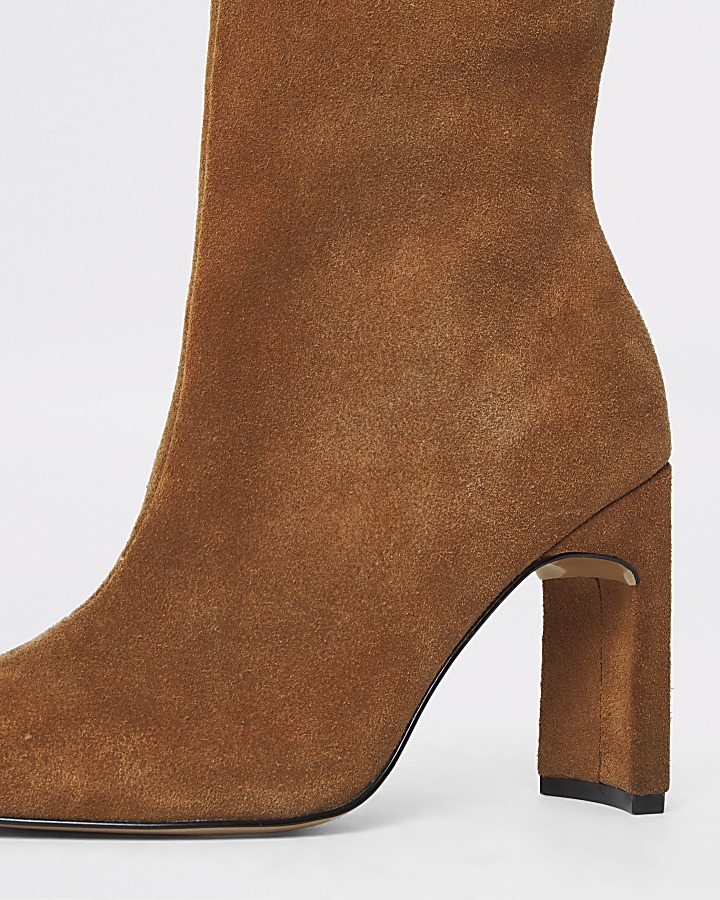 Beige suede heeled ankle boot
