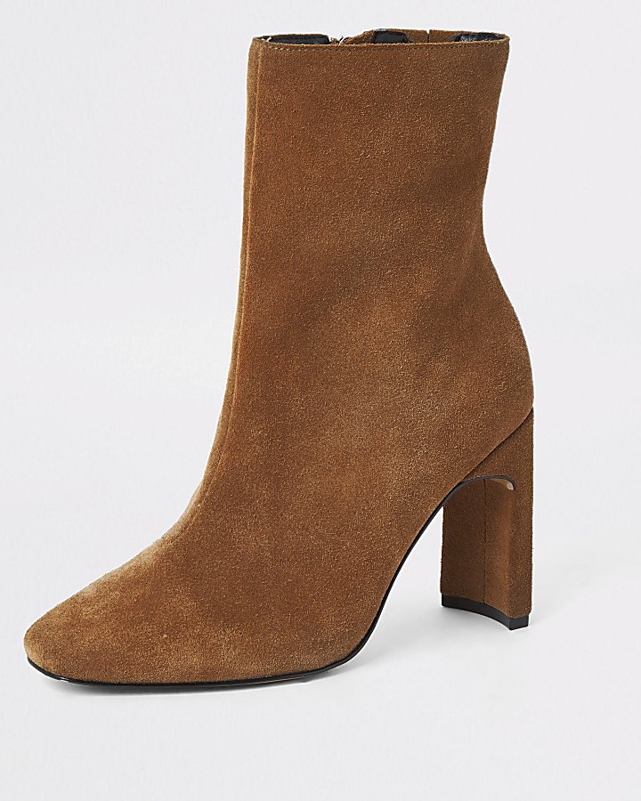 Beige suede heeled ankle boot