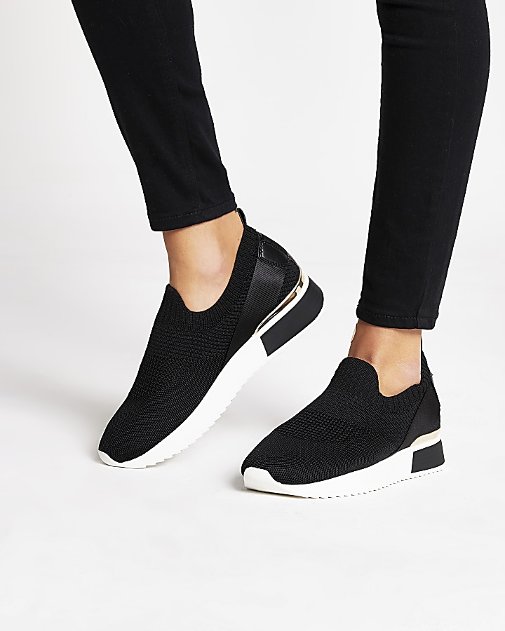 Black knitted runner trainers