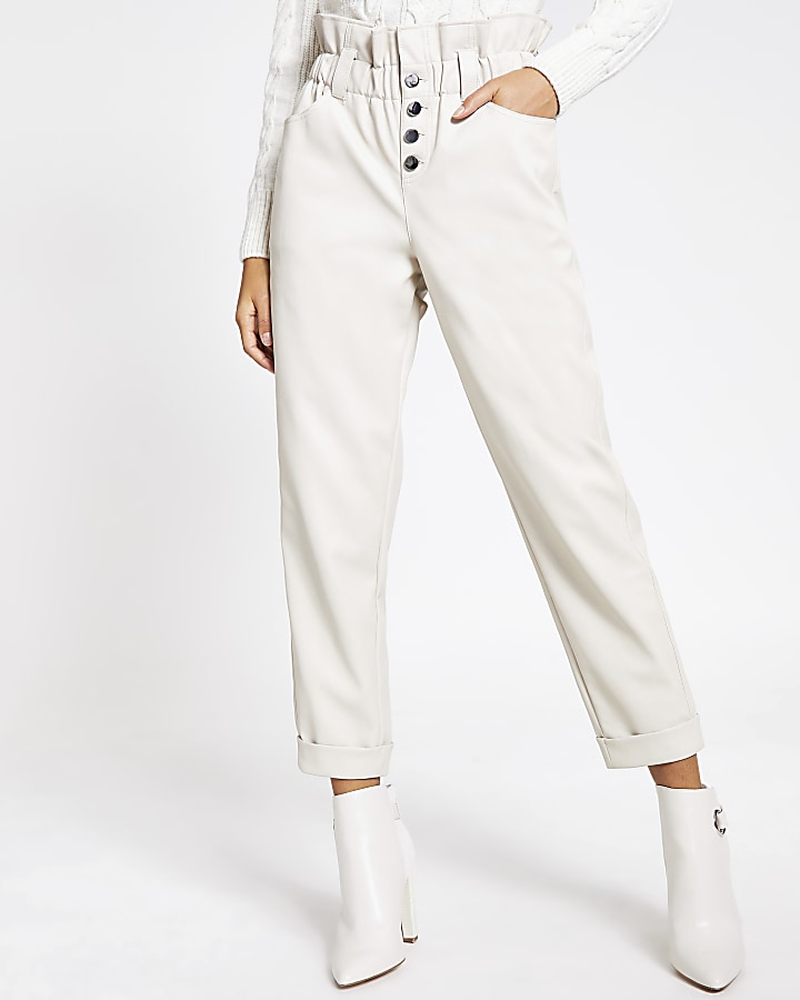 Cream faux leather paperbag button trousers
