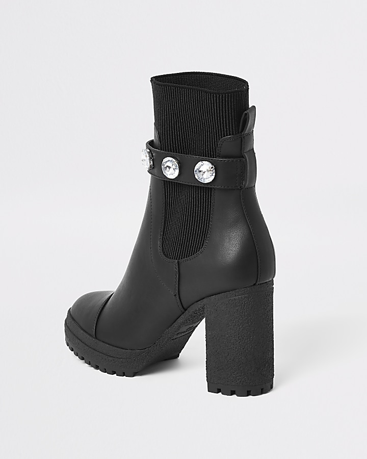 Black embellished strap sock boot