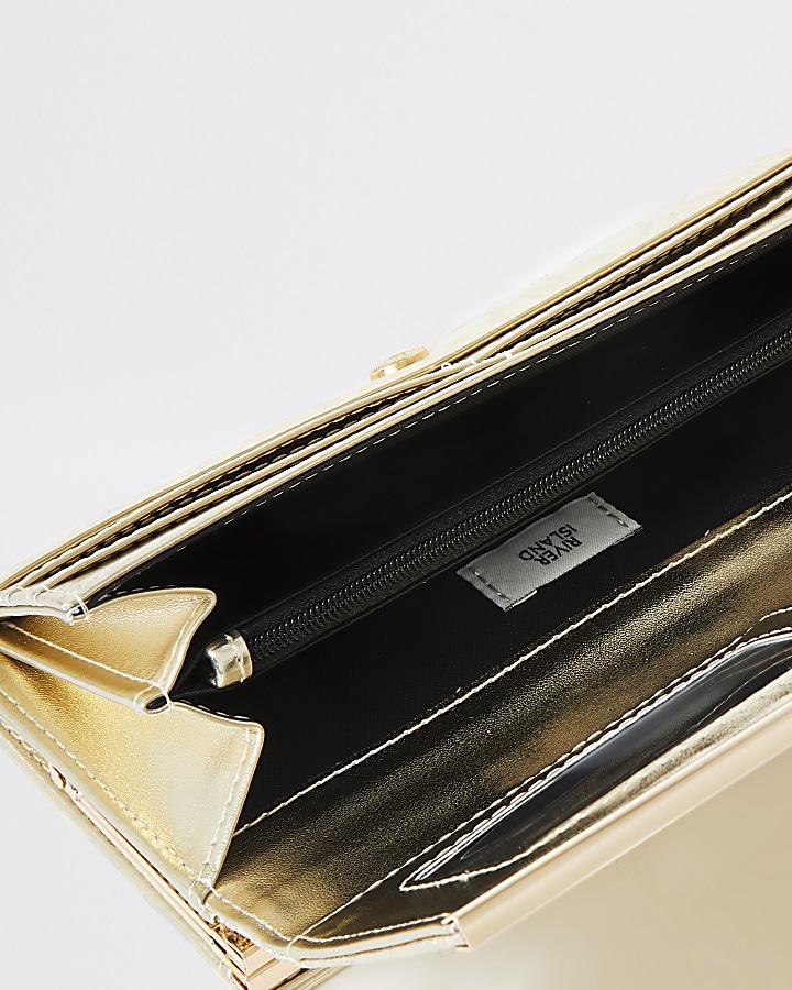 Gold metallic RI embossed clip top purse