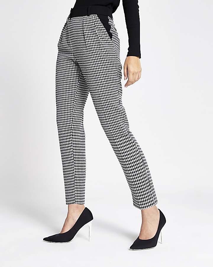 Black dogtooth pleated tapered peg trousers
