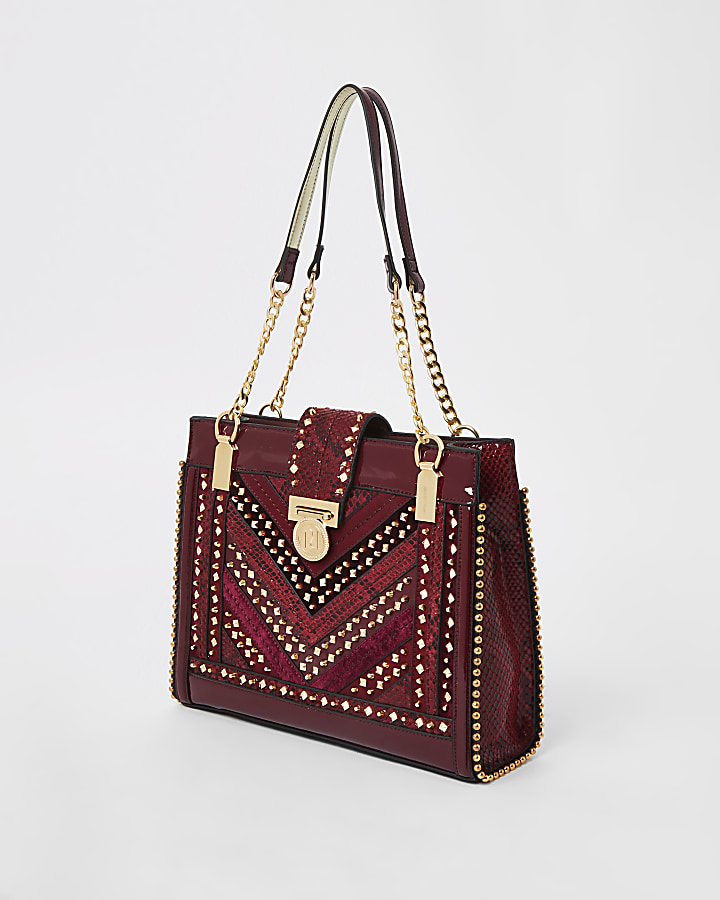 Red studded tote bag