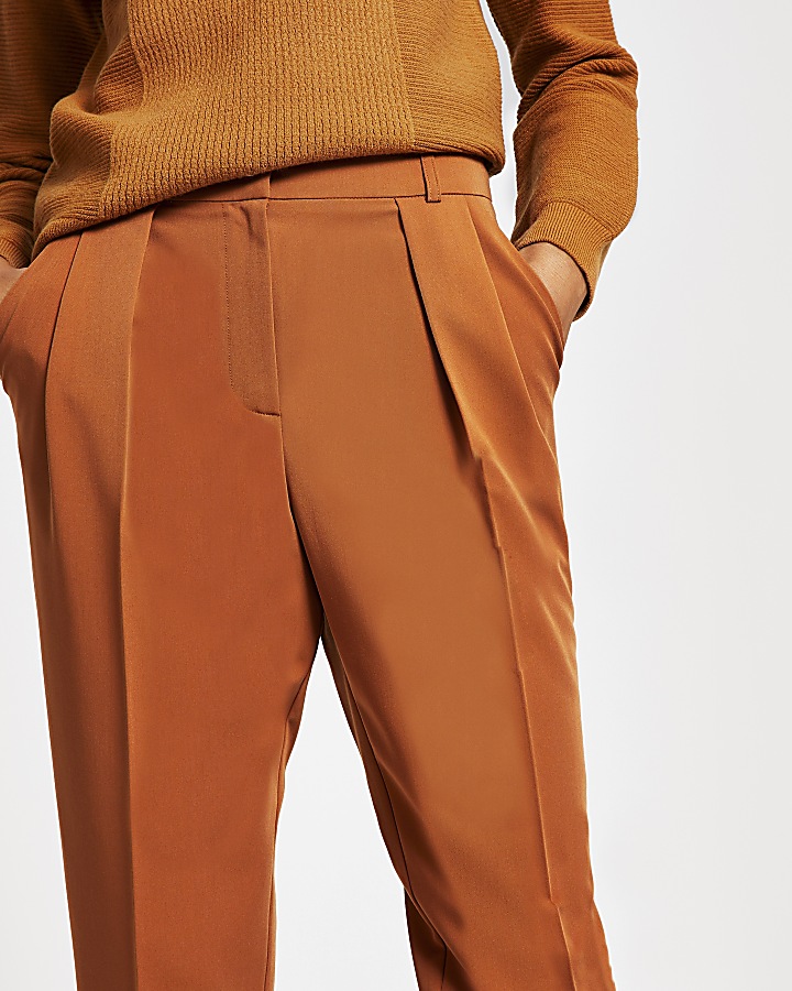 Brown pleated tapered trousers