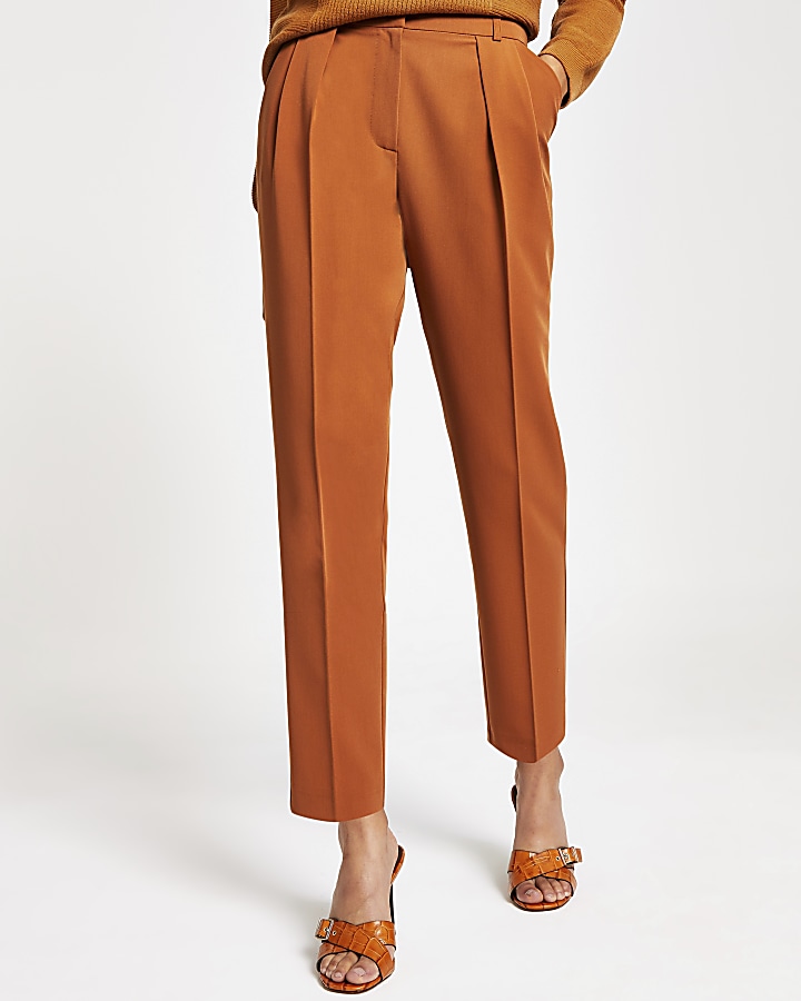 Brown pleated tapered trousers