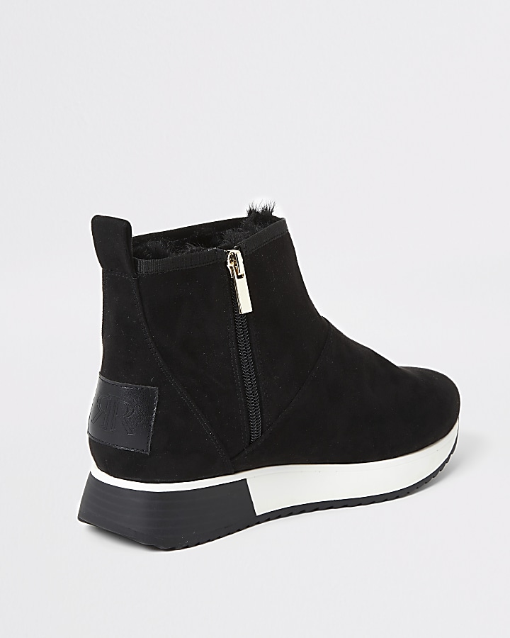 Black faux fur lined runner trainer boots