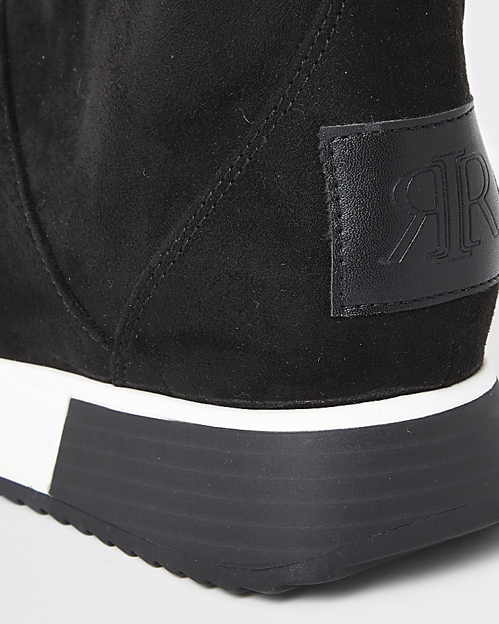 Black faux fur lined runner trainer boots