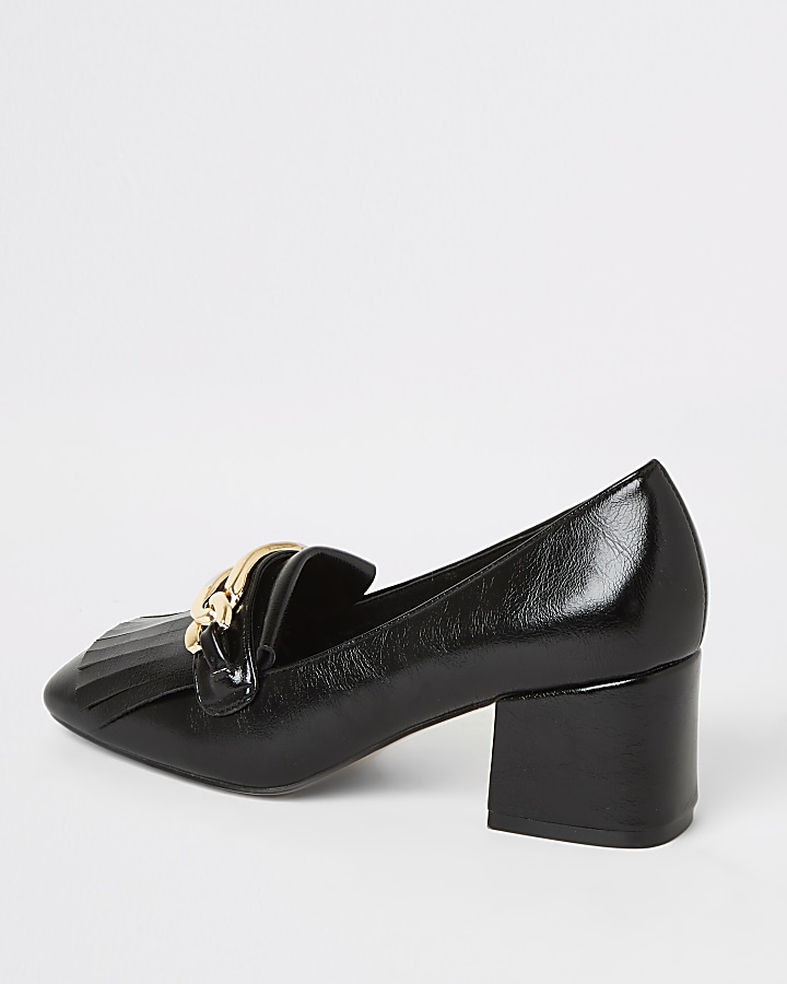 Black heeled snaffle tassel loafer