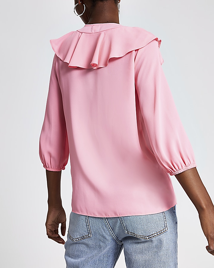 Pink frill front blouse