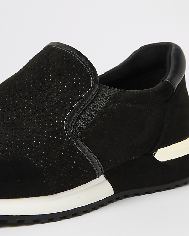 Black perforated runner trainers