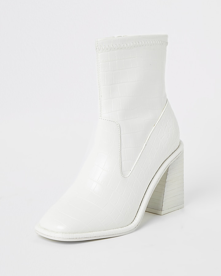 White croc embossed heeled ankle boots
