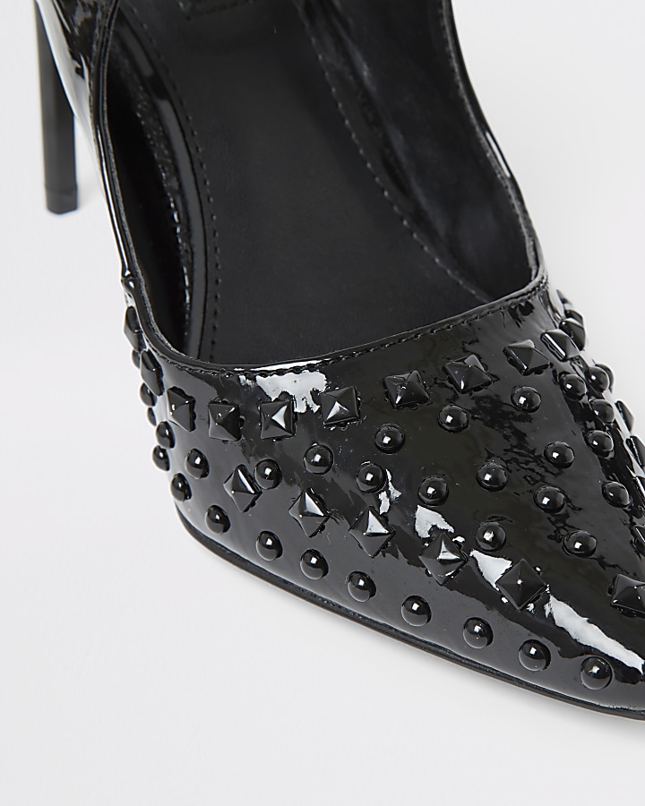 Black patent studded cut out court shoes