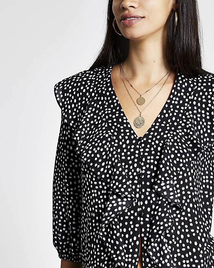Black polka dot frill front blouse