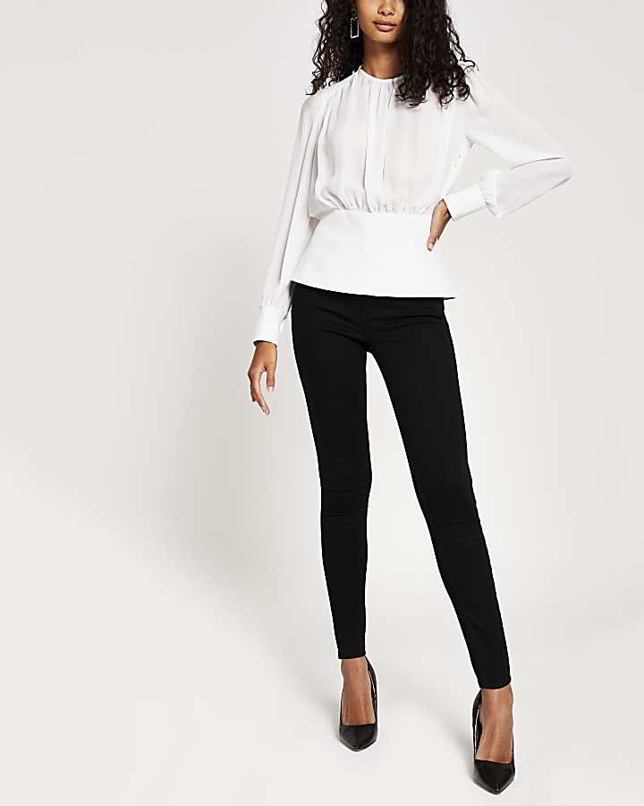 White long sleeve waisted top