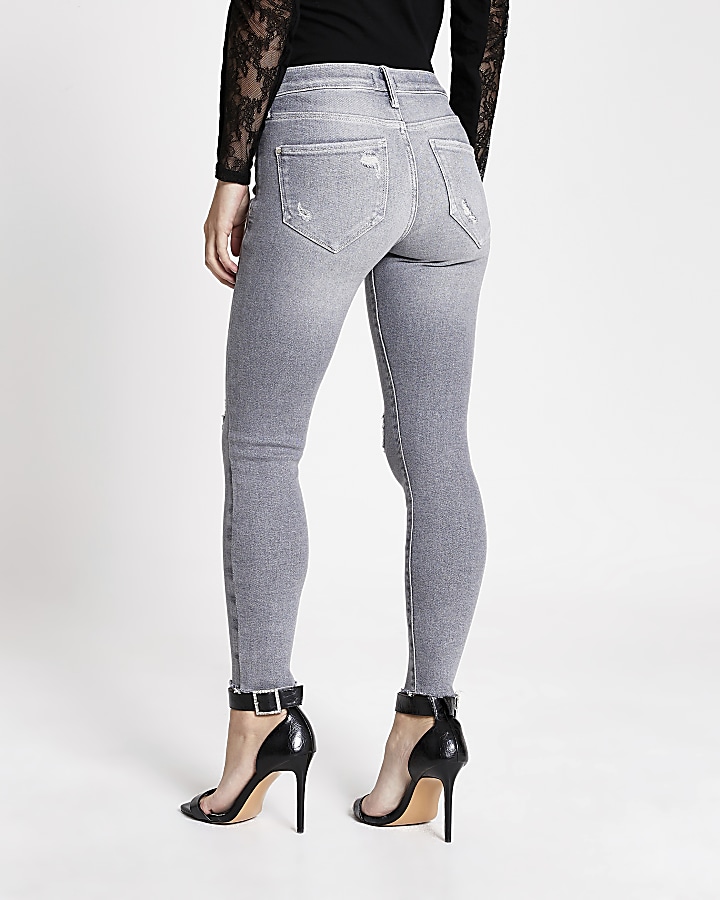 Petite grey ripped Molly mid rise jeggings