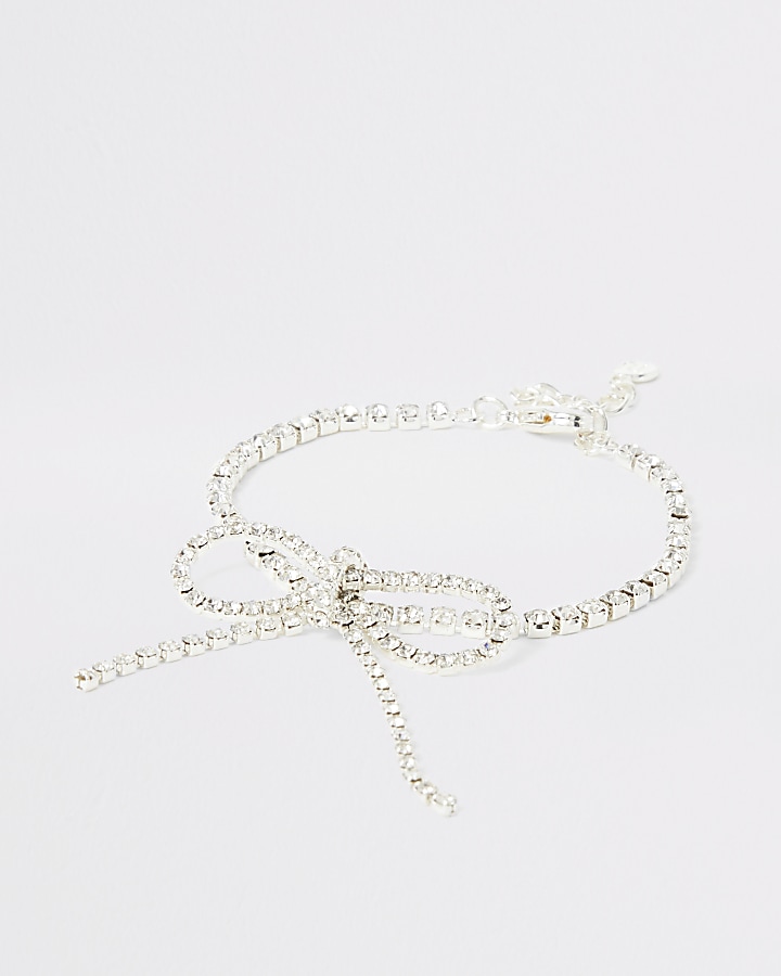 Silver colour bright diamante bow bracelet